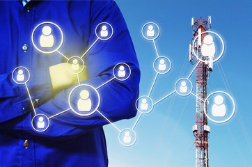 double exposure of man crossing arms and icon social media concept on telecommunication pole in blue sky as background, color tone effect.