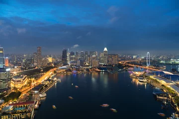 Deurstickers Aerial view of Singapore business district and city at twilight in Singapore, Asia. © ake1150