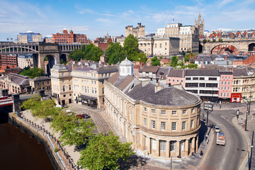 Naklejka premium Aerial view of Newcastle's Quayside, Castle Keep and Cathedral by the River Tyne.