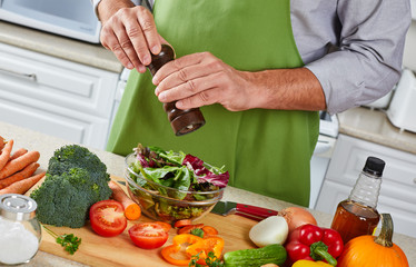 Chef man cooking in the kitchen.