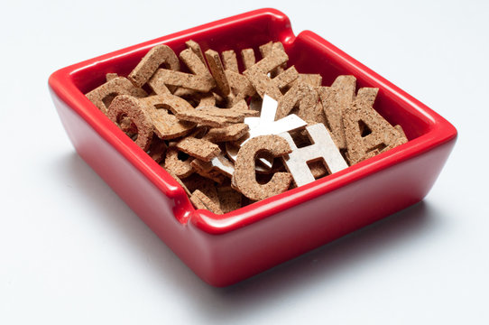 Wood Alphabet Letter In Red Tray With White Background, Isolated Conceptual Image