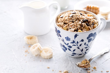 Healthy breakfast Muesli with milkhoney and banana