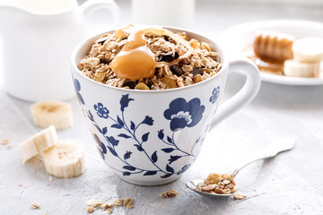 Healthy breakfast Muesli with milkhoney and banana