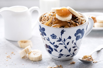 Healthy breakfast Muesli with milkhoney and banana