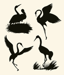 Vector background with pairs of storks in the nest
