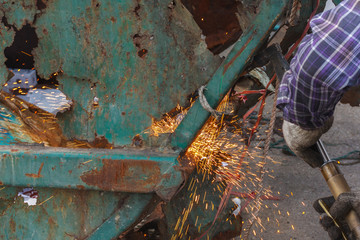 welder worker with cutting torch