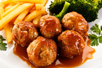 Roast meatballs and vegetables