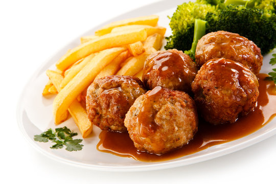 Roast meatballs and vegetables