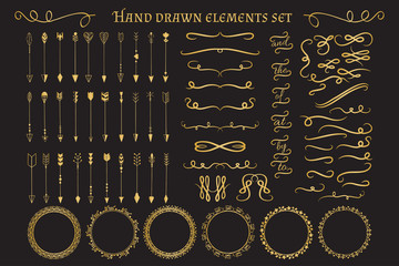 Gold decorative hand drawn design elements big set: arrows, frames, swirls, deviders and flourishes. Vector illustration.