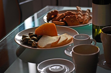 Olives and cheese. Evening falls