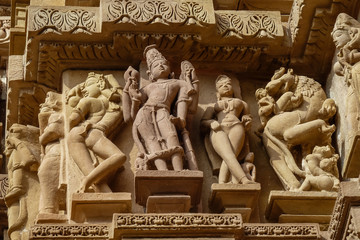 Close up of artful ancient sculptures, Khajuraho Group of Monuments, India