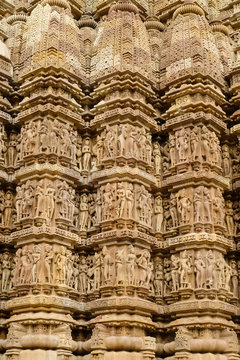 Close up of artful ancient carvings, Khajuraho Group of Monuments, India