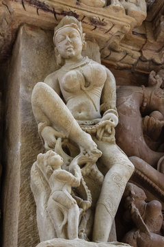 Close up of artful ancient sculptures, Khajuraho Group of Monuments, India