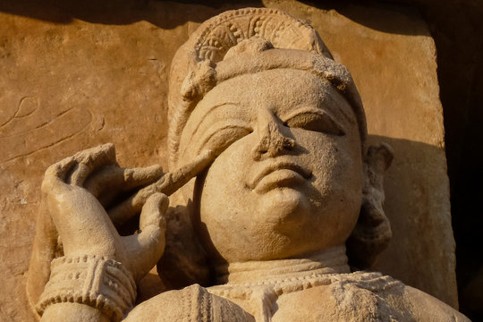 Portrait of artful ancient sculpture, Khajuraho Group of Monuments, India