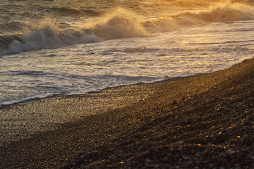 Waves at sunset, Brighton, England, UK