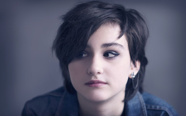 Fototapeta premium Teenage girl with short hair and makeup