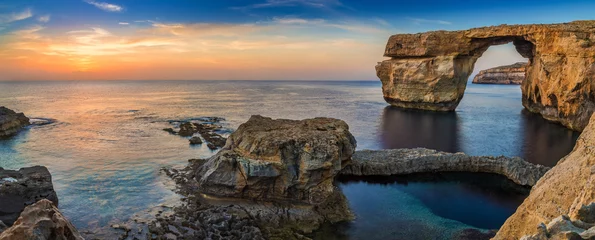 Poster Gozo, Malta - Panoramic view of the beautiful Azure Window, a natural arch and famous landmark on the island of Gozo at sunset © zgphotography
