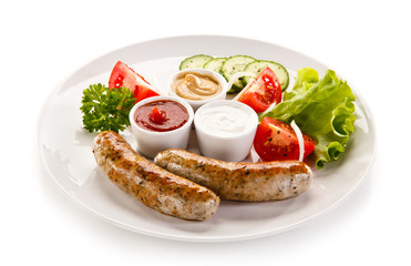 Breakfast - fried white sausages and vegetables 