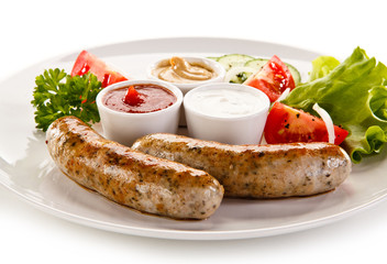 Breakfast - fried white sausages and vegetables 