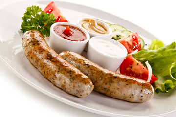 Breakfast - fried white sausages and vegetables 