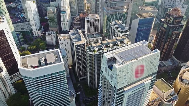 Aerial view of kuala lumpur cityscape. Drone video of asian scyscrapers. Blurred all logotypes.