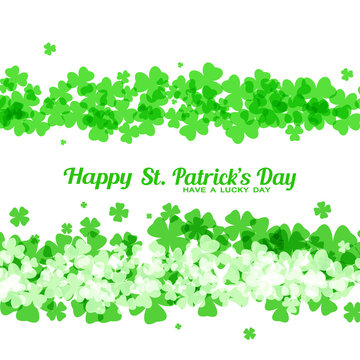 Vector abstract light background to Happy St. Patrick's Day with two lines of leaves of clover and text.