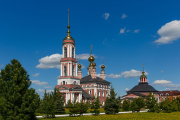 Fototapeta na wymiar Church of the Archangel Michael with a bell tower and the church of Florus and Laurus in Suzdal, Russia.