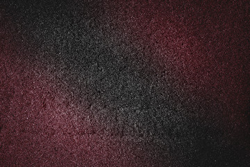 Colorful red pink abstract texture with black tone glitter background