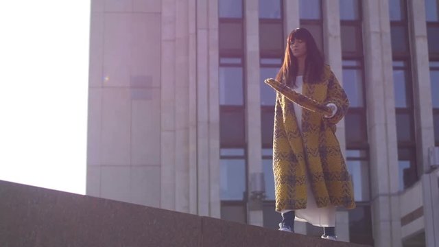 Female walking on city background
