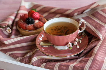 Tea and cake beautiful and delicious breakfast concept.