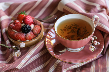 Tea and cake beautiful and delicious breakfast concept.