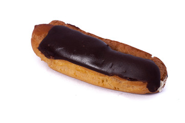 Sweet one chocolate eclairs isolated on white. Traditional french cakes cooked from choux dough filled with a cream