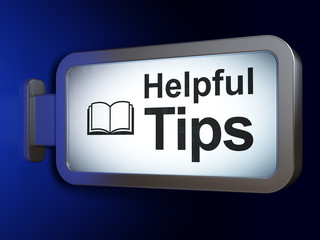 Education concept: Helpful Tips and Book on billboard background