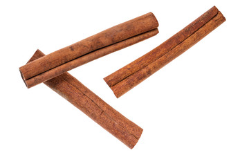 Cinnamon sticks isolated on white background,macro shot