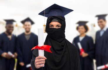 muslim student woman in hijab with diploma