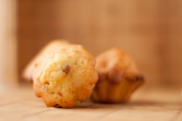 delicious Homemade muffins with raisins in warm color background