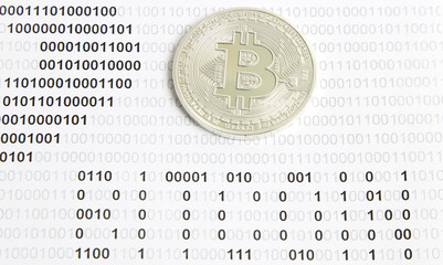 bitcoin on the background of binary code