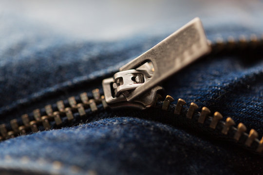 close up of denim item or jeans zipper