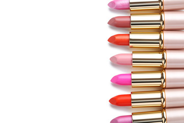 Obraz premium Colorful lipsticks isolated on a white