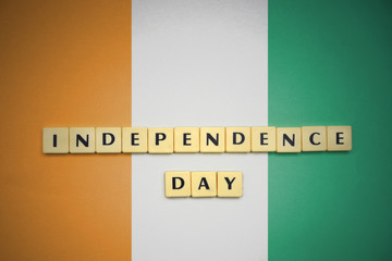 letters with text independence day on the national flag of cote divoire.