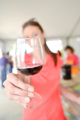 Woman holding a glass of wine
