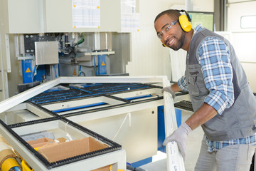 glass fabricator posing