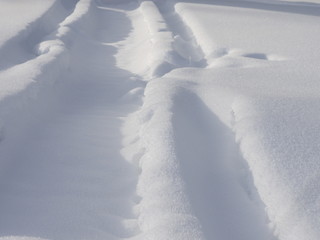 Fototapeta na wymiar Tracks in snow