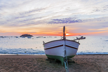 fishing boat on the coast of Tossa de Mar, Spain