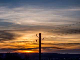 Strommast bei Sonnenuntergang