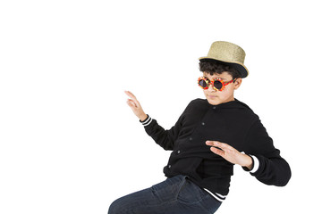 Boy wearing hat and sunglasses dancing.