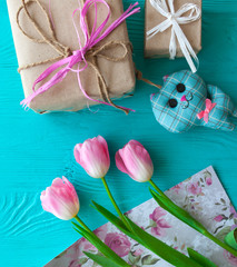 Mother's Day, woman's day. tulips ,presents on wooden background