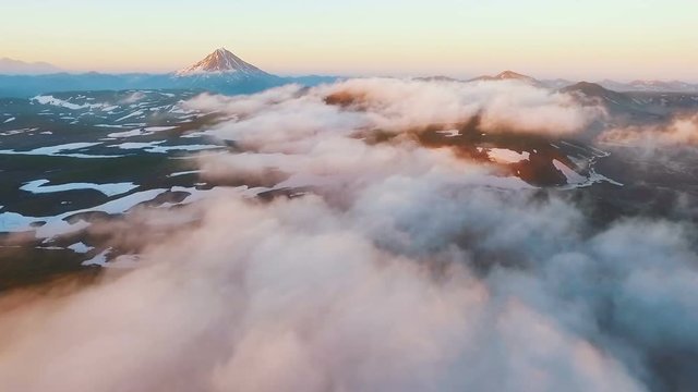 Aerial View. Aircraft flies through clouds. Amazing view.