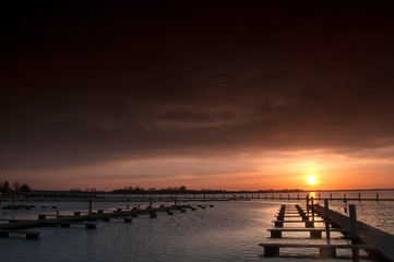 Harbor without ships at sunset