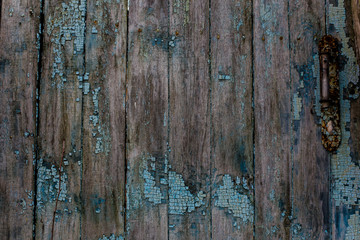 Ancient door with rusty iron handle